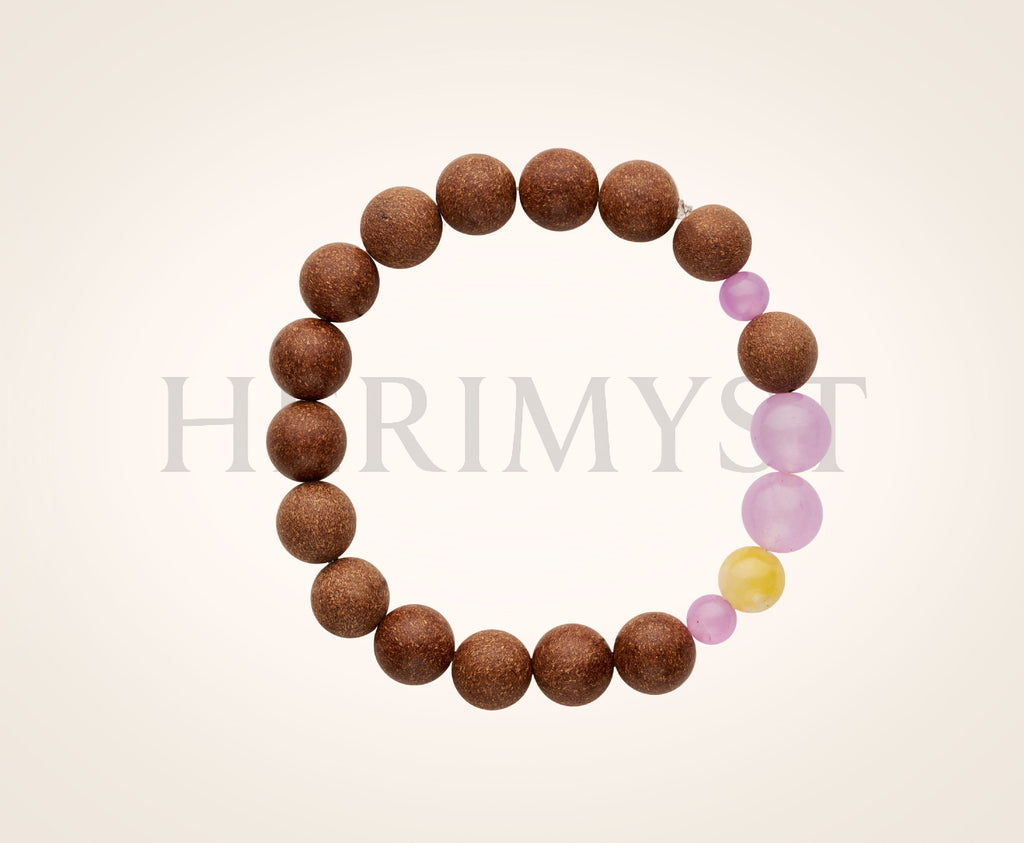 Herimyst Huān Yán incense bead bracelet, 10mm handcrafted beads paired with amber charm, from the Grace & Ritual Collection