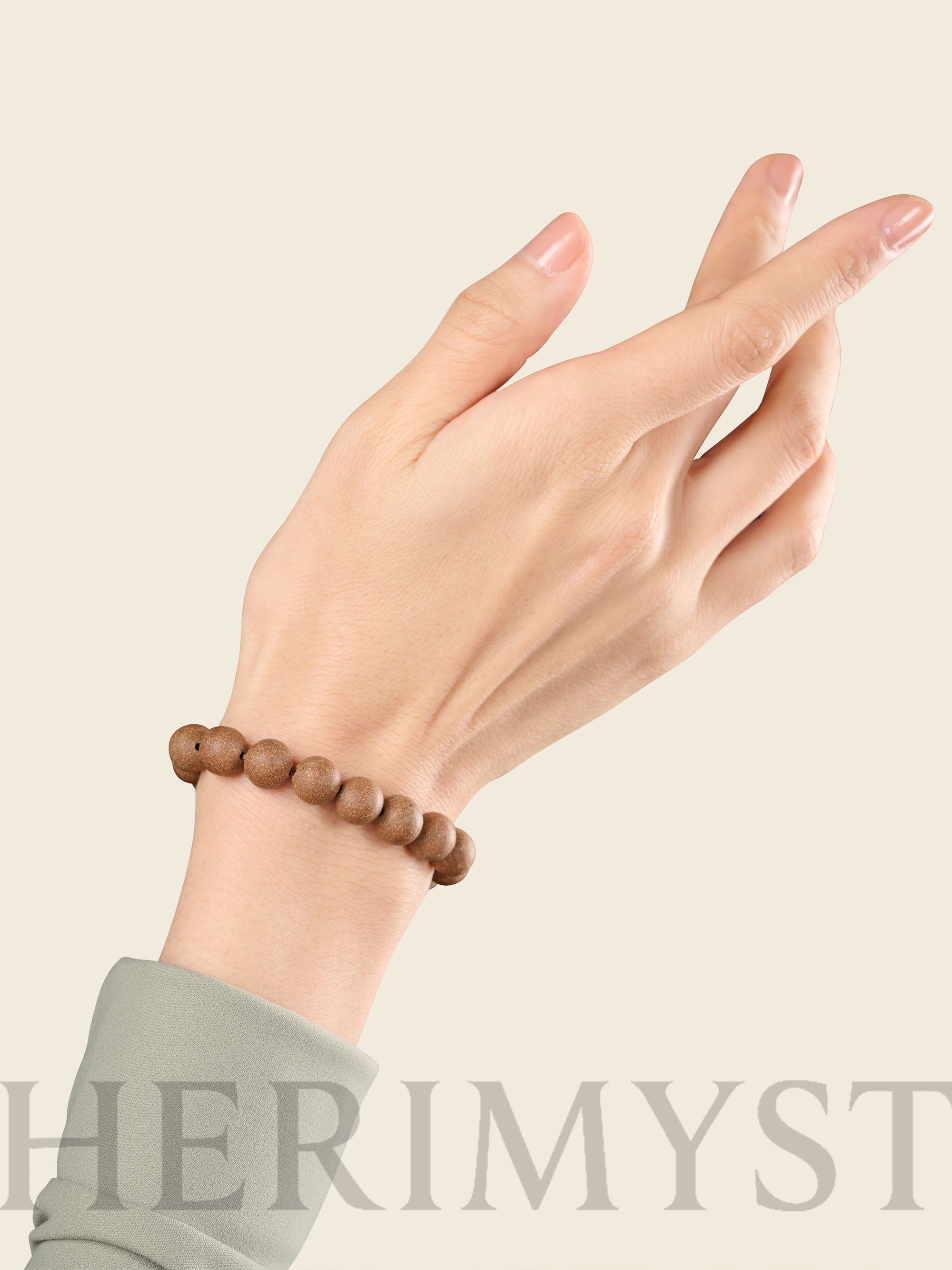 HERIMYST incense bead bracelet worn on wrist with natural wood beads
