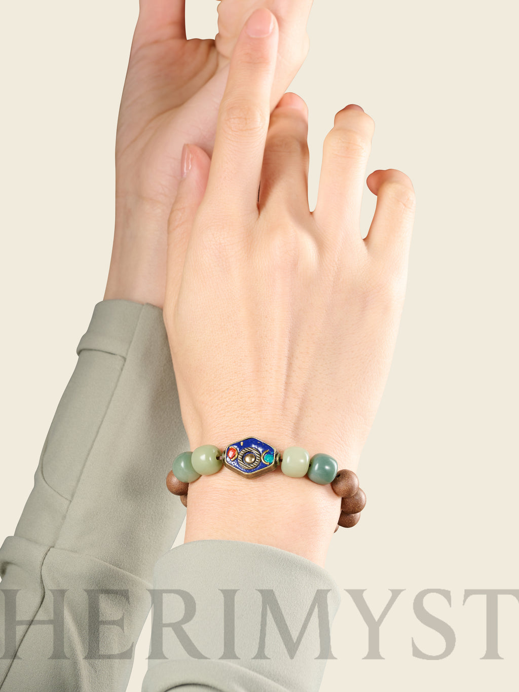 HERIMYST incense bead necklace worn around the neck, featuring natural wood beads with green stone accents