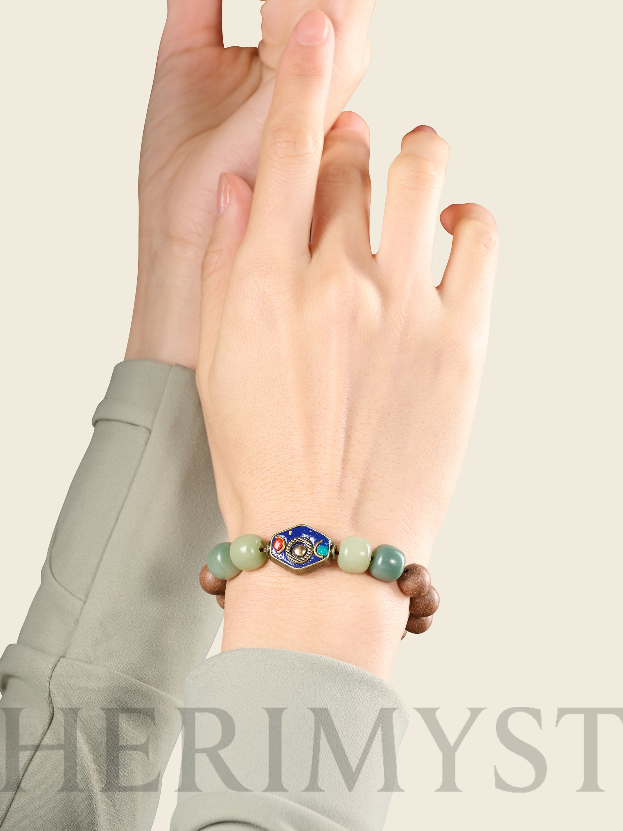 HERIMYST incense bead necklace worn around the neck, featuring natural wood beads with green stone accents