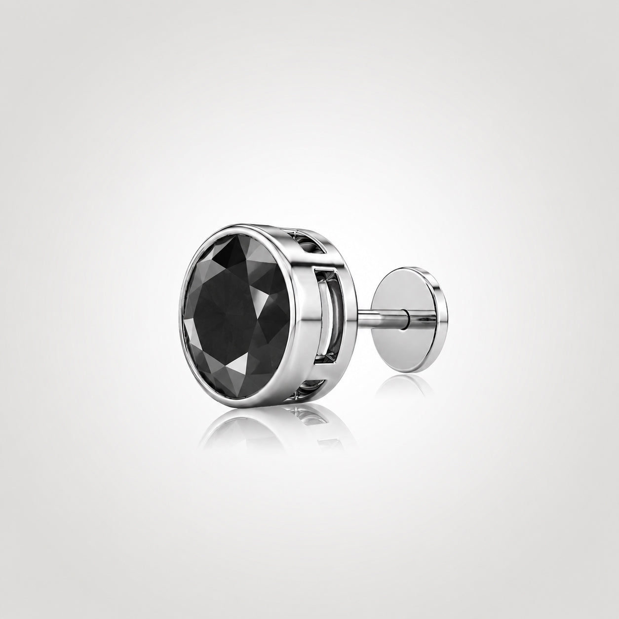 Side view of a black diamond stud with post and earring back