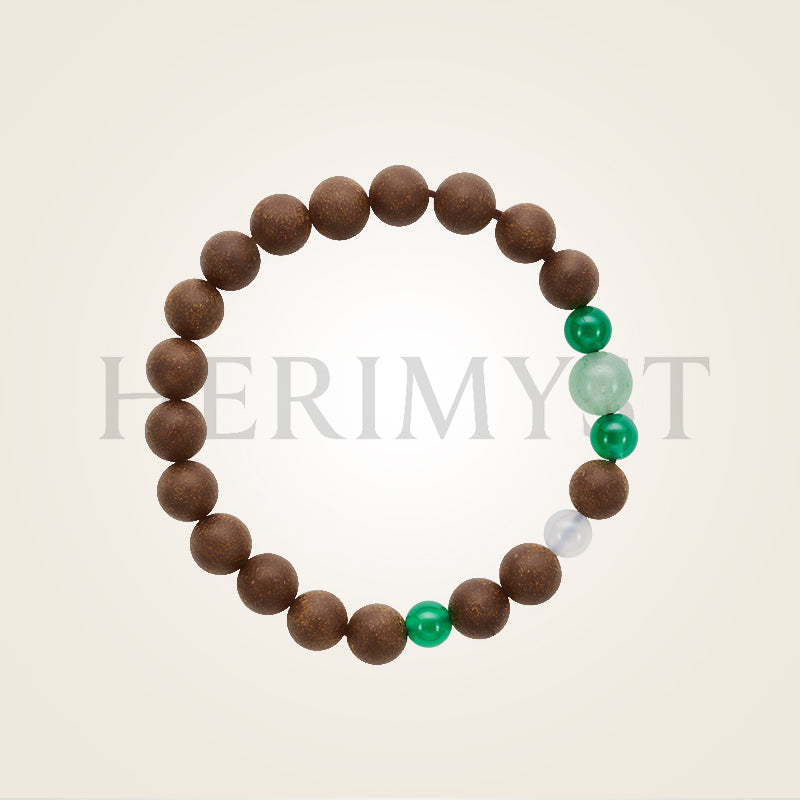 Herimyst Màn Xīn incense bead bracelet and necklace from the Grace & Ritual Collection, 8 mm handcrafted beads with aventurine jade and green agate accents in a soft neutral setting.