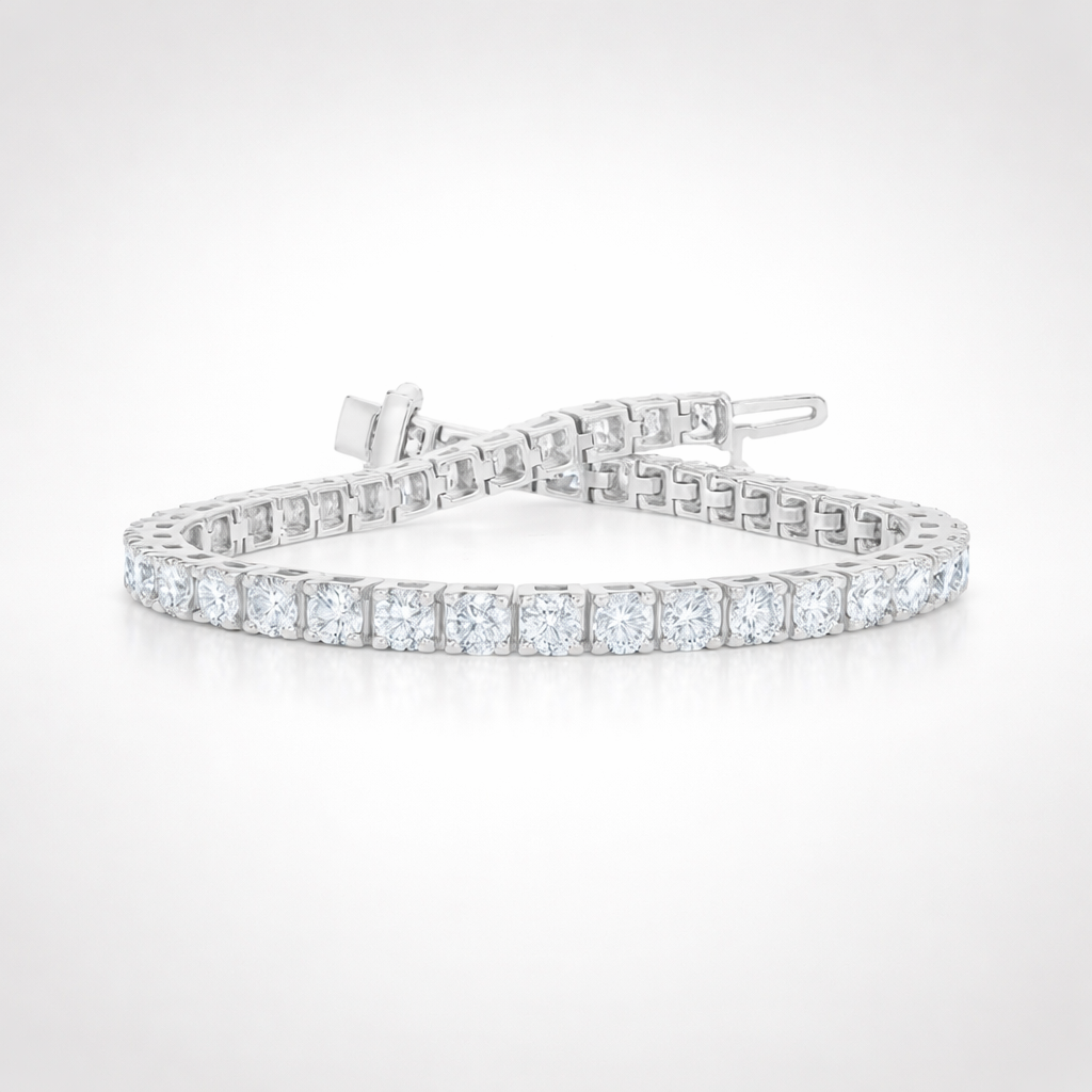 Round brilliant diamond tennis bracelet set in 14K white gold on soft white gradient background