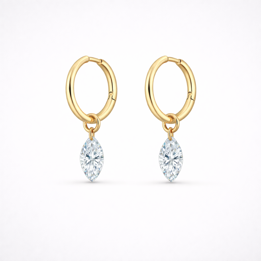 Pair of marquise floating diamond drop huggie earrings in 14K yellow gold, featuring lab-grown diamonds with free-moving design