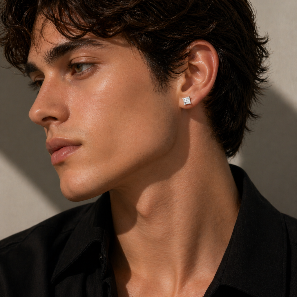 Princess cut diamond stud earrings for men, 14K gold square diamond earring, four prong setting, medium shot on ear