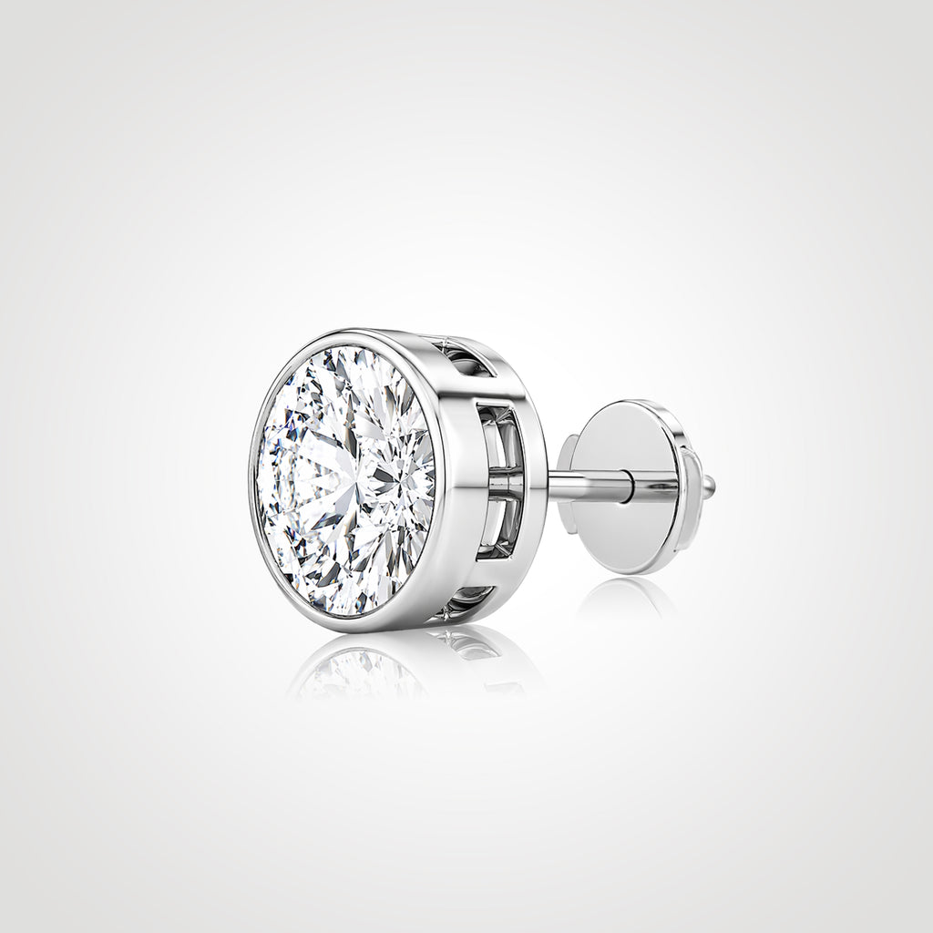 Round lab-grown diamond stud in 14K white gold with a bezel setting and Guardian Back, shown from an angled side view.