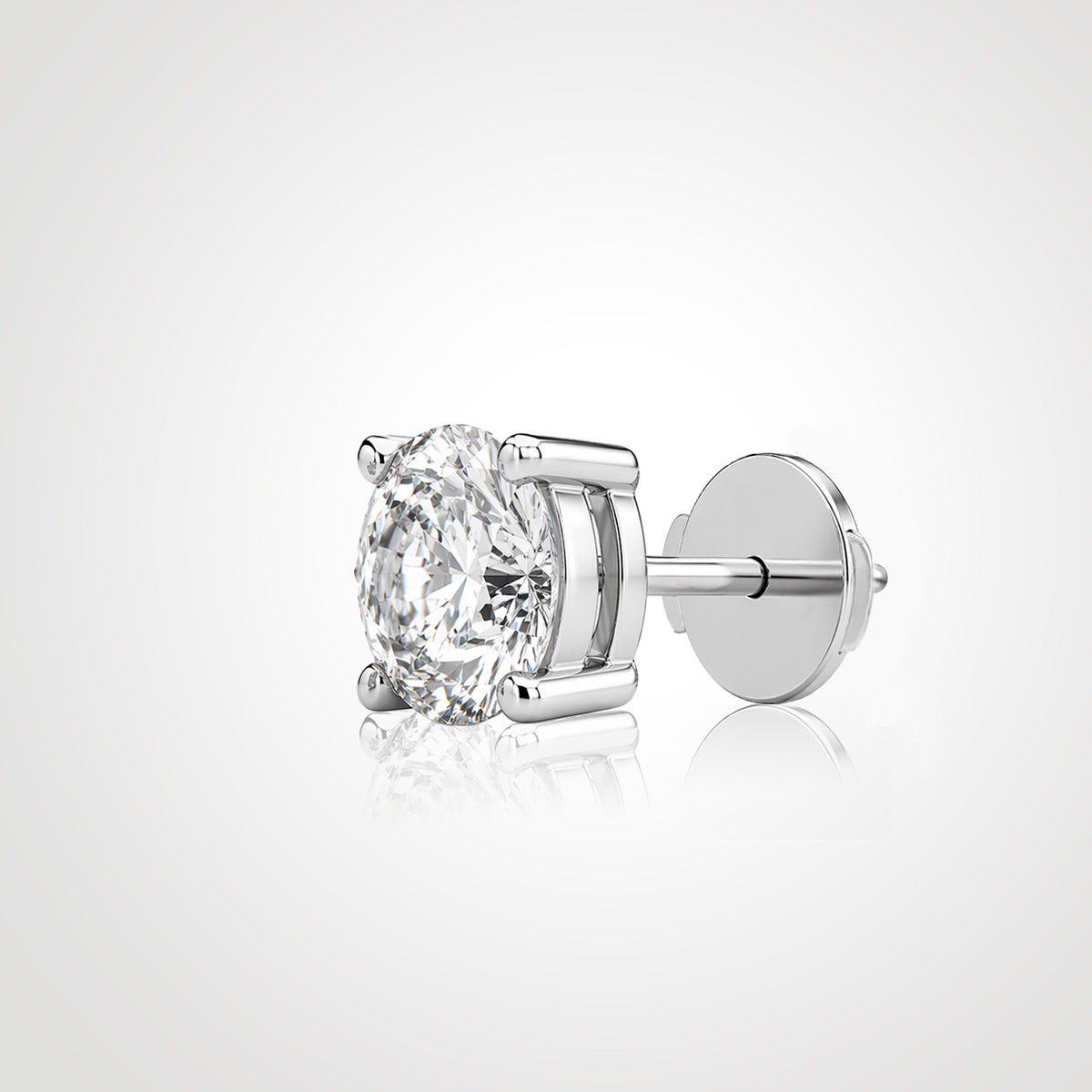 Round lab-grown diamond stud in 14K white gold with a four-prong setting and Guardian Back, shown from an angled side view.