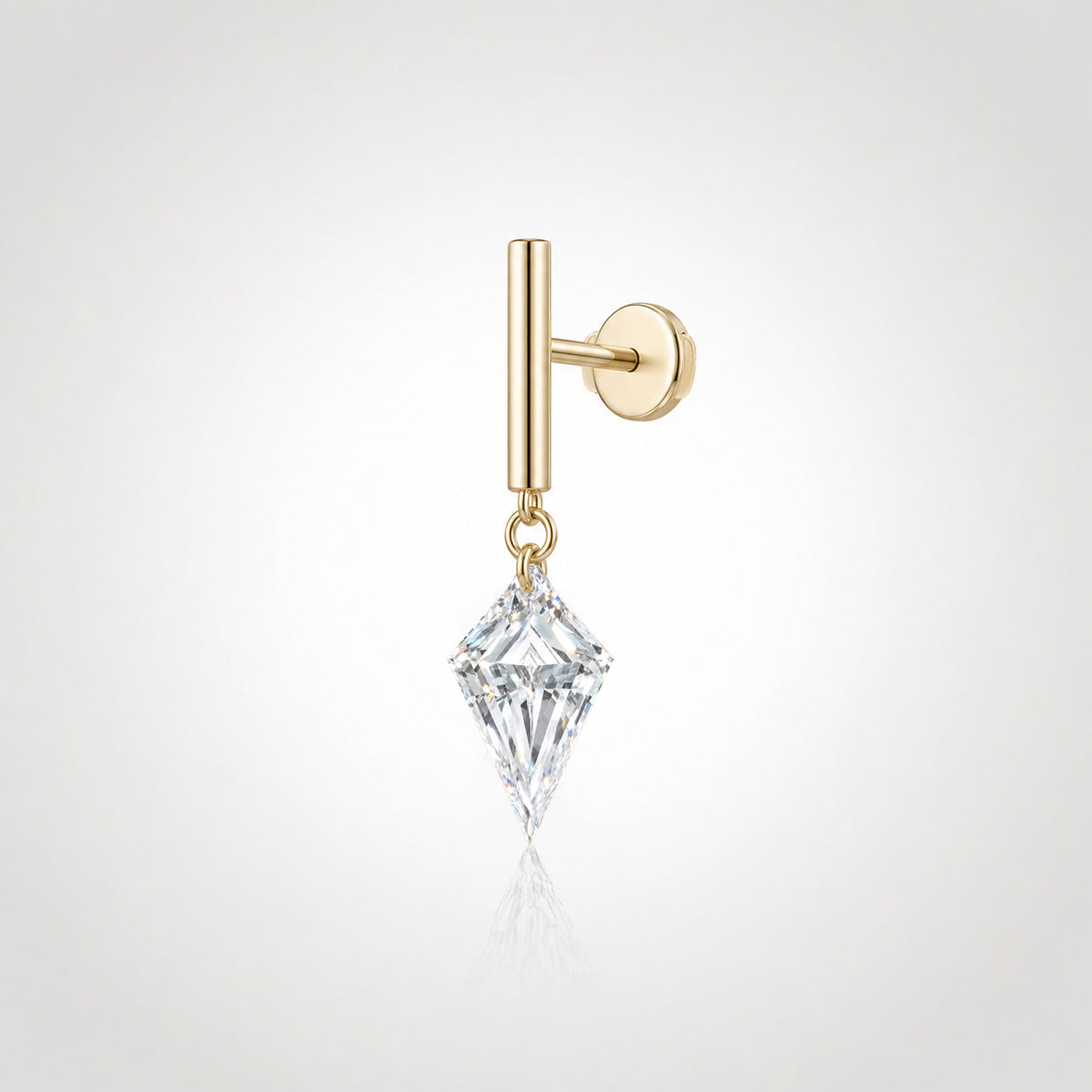 Kite-cut floating lab-grown diamond drop stud in 14K yellow gold with a Guardian Back, shown from an angled side view.