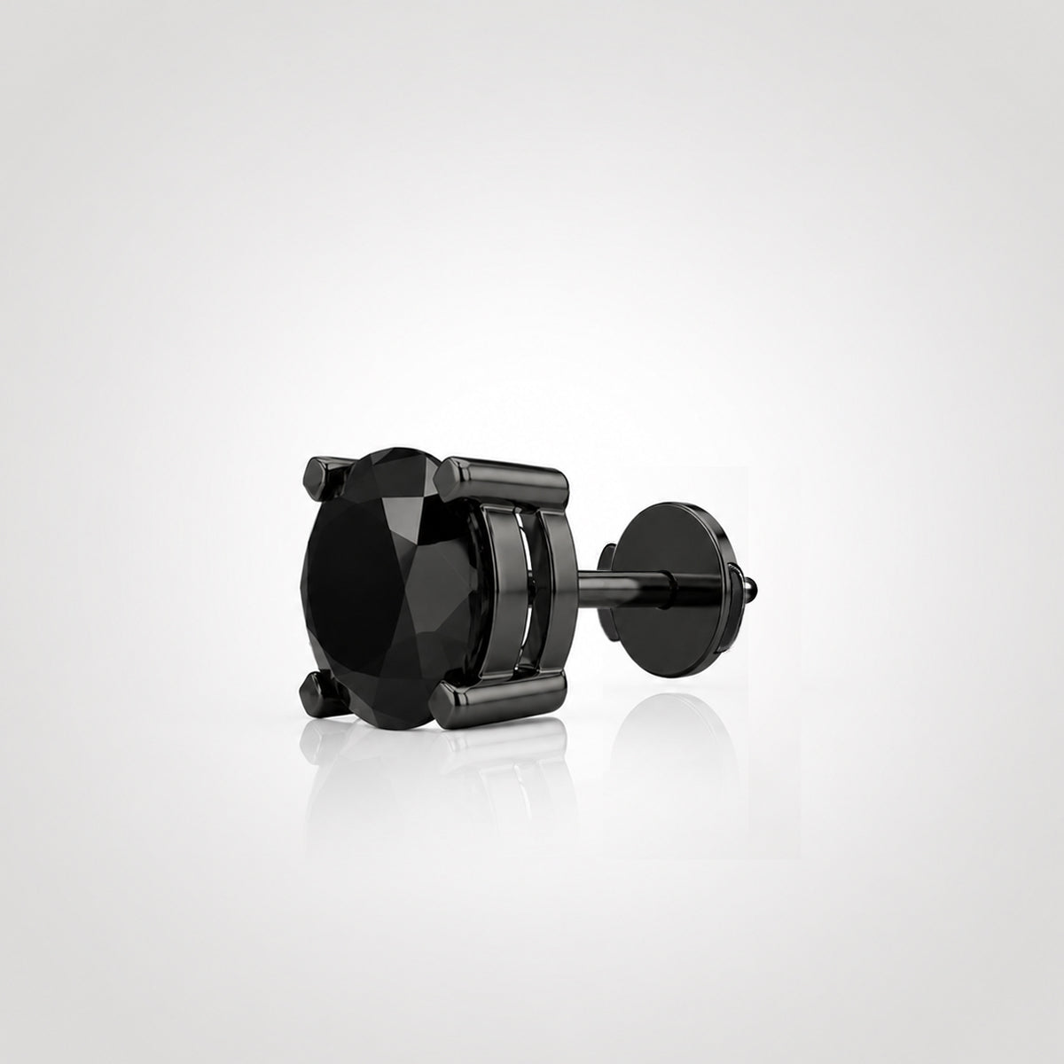 Natural black diamond stud in a black four-prong setting with a Guardian Back, shown from an angled side view.